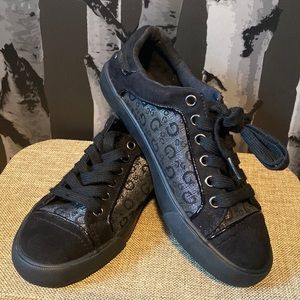 All black Guess sneakers with metallic silver accents monogram sparkle